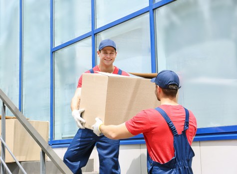 Boxes and household items loaded into a removal van for a local move