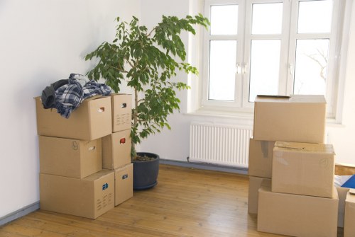 Packed office boxes and equipment ready for removal in Pratts Bottom