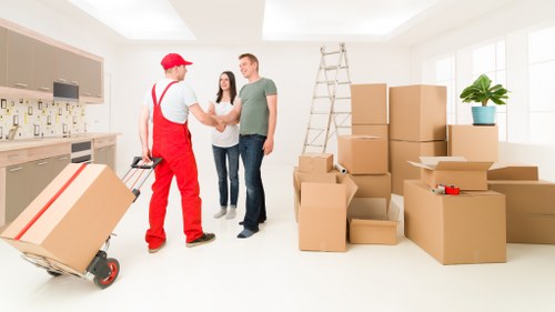 Careful loading of household furniture during a Pratts Bottom moving day