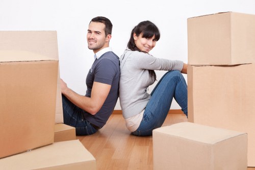 Loading furniture into a local removal van